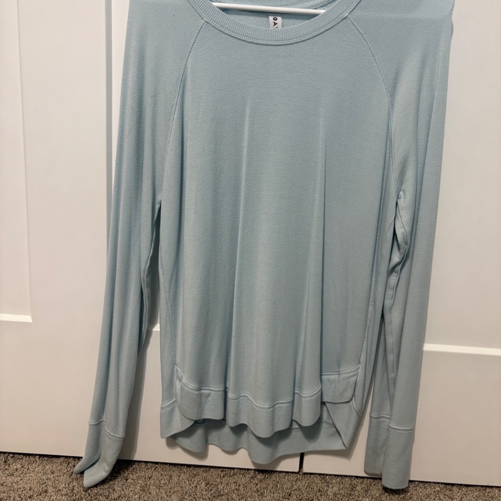 Athleta lihh g t blue long sleeve slight stain on the arm but other than that g